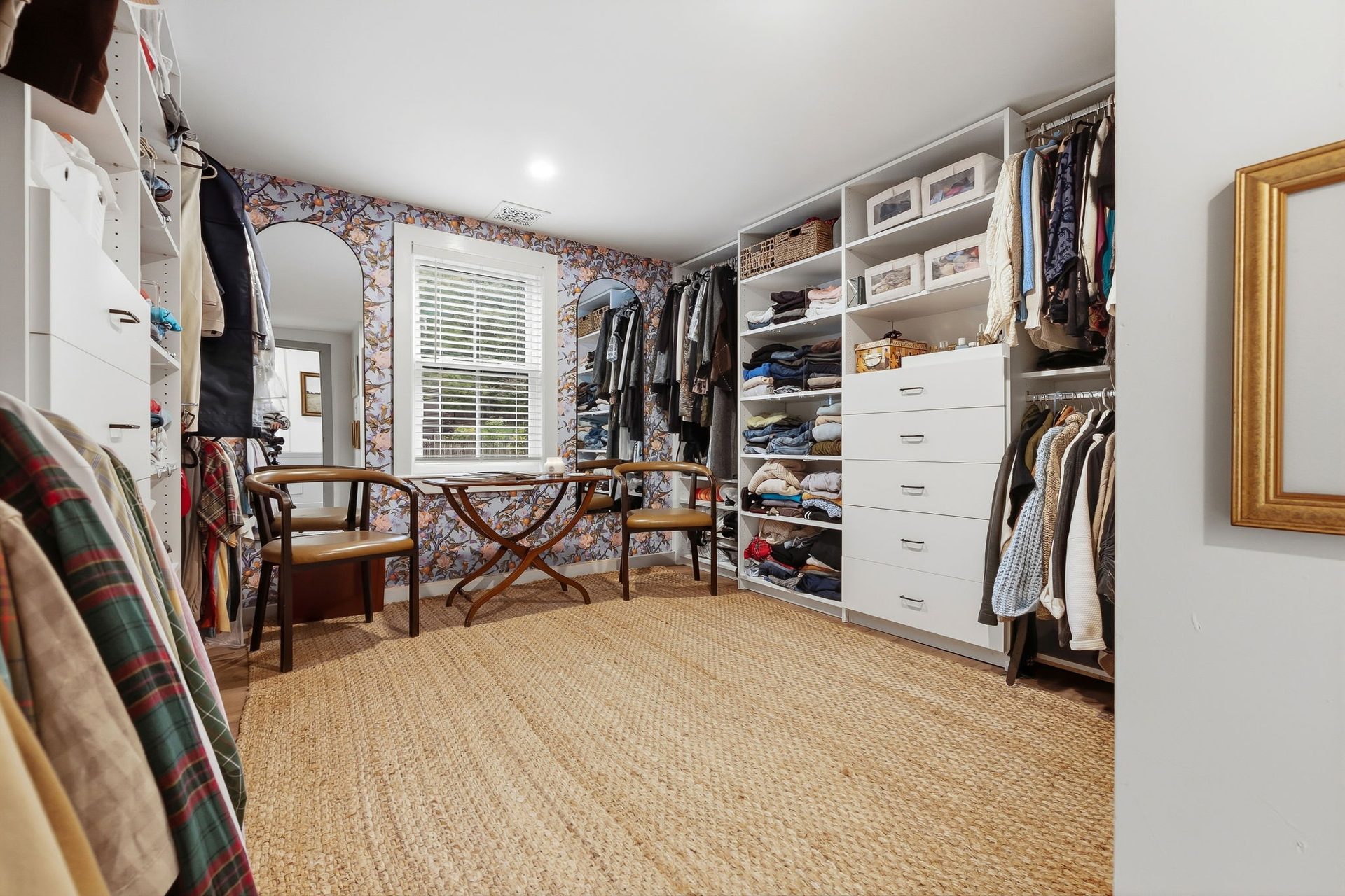 The second main-level bedroom set up as a dressing room