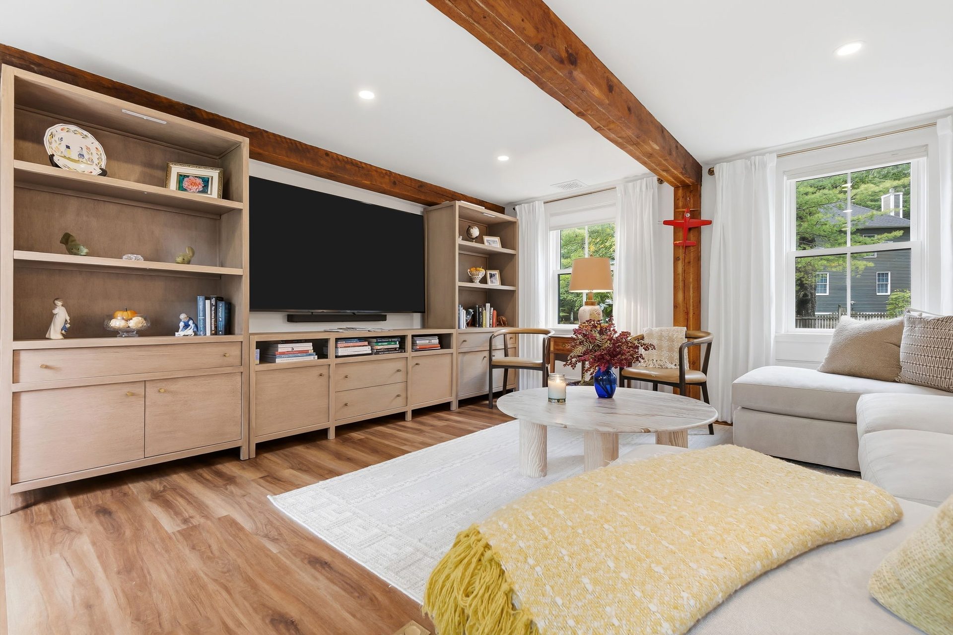 The built-in shelving and media wall