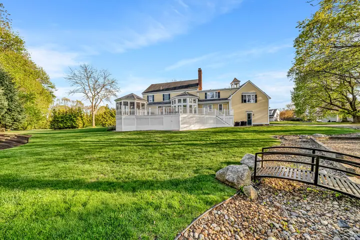 The back lawn and garden bridge